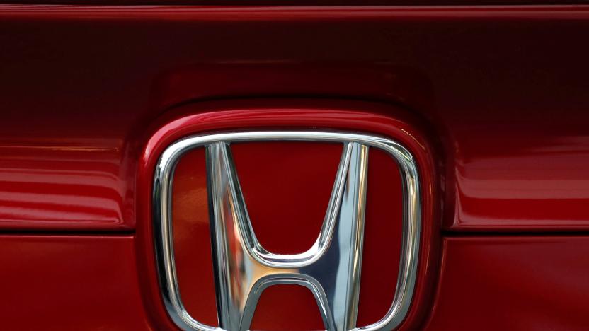 Honda Motor's logo is seen on Civic sedan car at its showroom in Tokyo, Japan October 4, 2017. REUTERS/Kim Kyung-Hoon