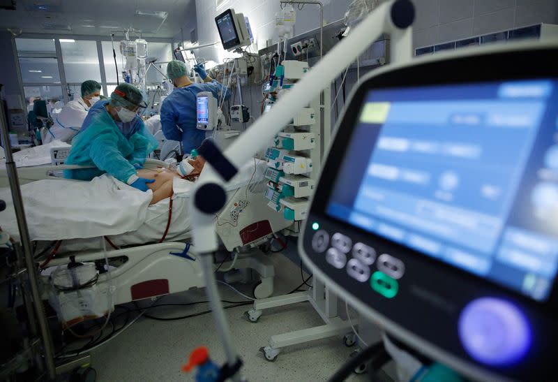 Poland reports new daily record of 57,659 COVID cases