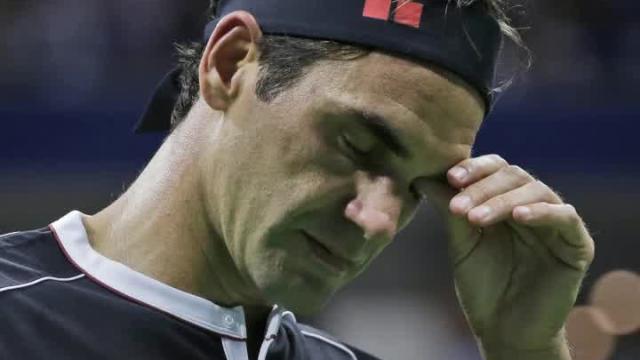 Roger Federer falls