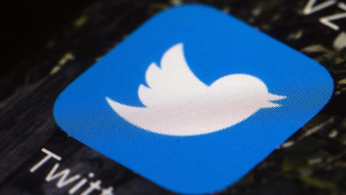 FILE - A Twitter app icon on a mobile phone is displayed in Philadelphia, U.S.A., April 26, 2017. Elon Musk plans to change the logo of Twitter to an “X” from the bird, marking what would be the latest big change since he bought the social media platform for $44 billion last year. (AP Photo/Matt Rourke, File)