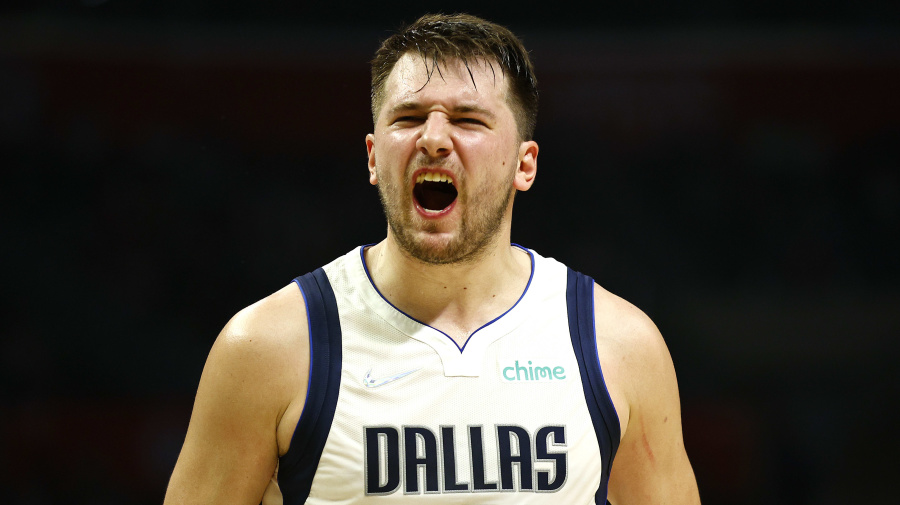Getty Images - LOS ANGELES, CALIFORNIA - NOVEMBER 23: Luka Doncic #77 of the Dallas Mavericks reacts during the second half of a game against the LA Clippers at Staples Center on November 23, 2021 in Los Angeles, California. NOTE TO USER: User expressly acknowledges and agrees that, by downloading and/or using this photograph, User is consenting to the terms and conditions of the Getty Images License Agreement.  (Photo by Sean M. Haffey/Getty Images)