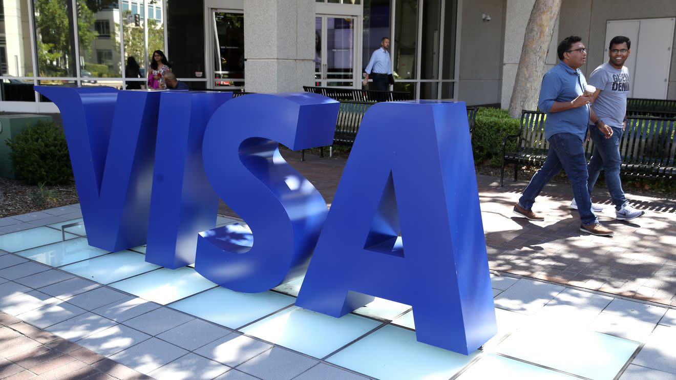 Visa beats on earnings, increases dividend by 20%