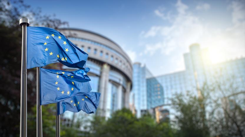 European union flag against parliament in Brussels, Belgium