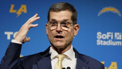 Getty Images - INGLEWOOD, CA - FEBRUARY 01: New Los Angeles Chargers Head Coach Jim Harbaugh speaks during his introductory press conference at YouTube Theater in Inglewood Thursday, Feb. 1, 2024. (Allen J. Schaben / Los Angeles Times via Getty Images)