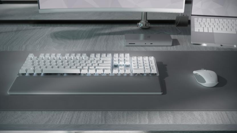 Razer's Pro Type Ultra keyboard and Pro Click Mini mouse on top of the Pro Glide XXL mousepad.