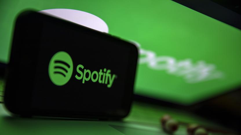 TURKEY - 2021/12/02: In this photo illustration the Spotify logo seen displayed on a smartphone screen on a laptop computer. (Photo Illustration by Onur Dogman/SOPA Images/LightRocket via Getty Images)