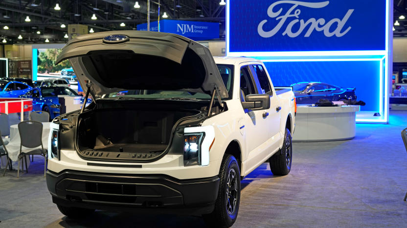 FILE - The Ford F-150 Lightning displayed at the Philadelphia Auto Show on Jan. 27, 2023, in Philadelphia. Ford says it’s reducing production of the F-150 Lightning electric pickup vehicle as it adjusts to weaker-than-expected electric vehicle sales growth.