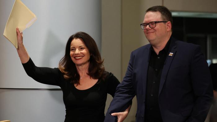 SAG-AFTRA union President Fran Drescher and SAG-AFTRA chief negotiator Duncan Crabtree-Ireland attend a press conference after SAG-AFTRA TV/Theatrical Committee approved a tentative agreement with the Alliance of Motion Picture and Television Producers (AMPTP) to bring an end to the actors strike, in Los Angeles, California, U.S., November 10, 2023. REUTERS/Mike Blake