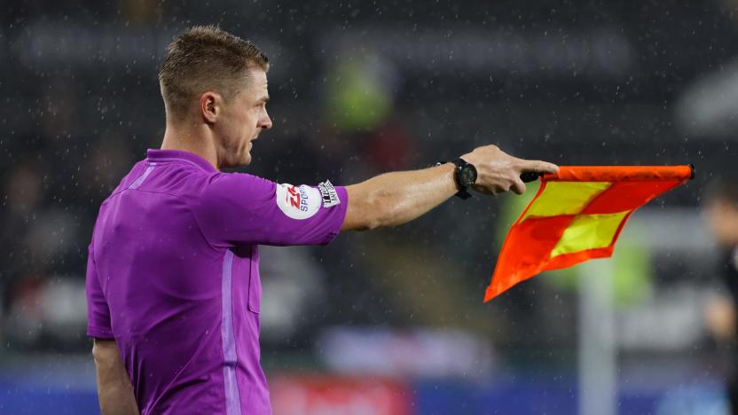 SWANSEA, WALES - OCTOBER 20: Assistant referee Daniel Robathan awards an off-side to West Bromwich Albion during the Sky Bet Championship match between Swansea City and West Bromwich Albion at the Swansea.com Stadium on October 20, 2021 in Swansea, Wales. (Photo by Athena Pictures/Getty Images)