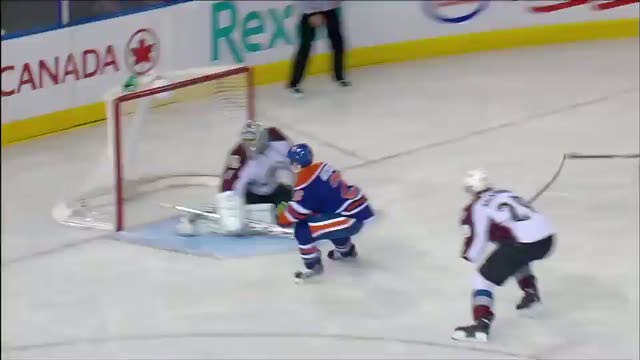 Mark Arcobello scores in front of Varlamov