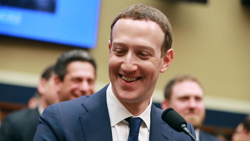 WASHINGTON, DC - APRIL 11:  Facebook co-founder, Chairman and CEO Mark Zuckerberg smiles at the conclusion of his testimony before the House Energy and Commerce Committee in the Rayburn House Office Building on Capitol Hill April 11, 2018 in Washington, DC. This is the second day of testimony before Congress by Zuckerberg, 33, after it was reported that 87 million Facebook users had their personal information harvested by Cambridge Analytica, a British political consulting firm linked to the Trump campaign.  (Photo by Chip Somodevilla/Getty Images)
