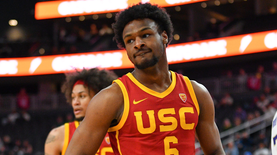 Getty Images - LAS VEGAS, NV - MARCH 13: USC Trojans guard Bronny James (6) looks on during the first round game of the men's Pac-12 Tournament  between the USC Trojans and the Washington Huskies on March 13, 2024, at the T-Mobile Arena in Las Vegas, NV. (Photo by Brian Rothmuller/Icon Sportswire via Getty Images)