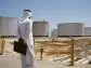 Saudi Aramco profits hit by falling oil prices