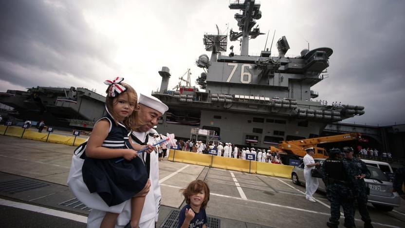 AP Photo/Eugene Hoshiko