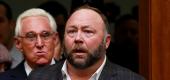 Alex Jones of Infowars, right, is followed by political operative Roger Stone prior to the testimony of Google CEO Sundar Pichai at a House Judiciary Committee hearing. (Reuters)