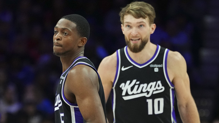 Getty Images - PHILADELPHIA, PENNSYLVANIA - JANUARY 12: Domantas Sabonis #10 and De'Aaron Fox #5 of the Sacramento Kings look on against the Philadelphia 76ers at the Wells Fargo Center on January 12, 2024 in Philadelphia, Pennsylvania. NOTE TO USER: User expressly acknowledges and agrees that, by downloading and or using this photograph, User is consenting to the terms and conditions of the Getty Images License Agreement. (Photo by Mitchell Leff/Getty Images)