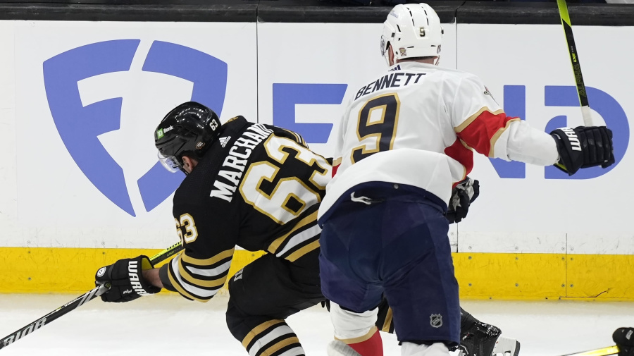 Associated Press - Florida Panthers' Sam Bennett (9) checks Boston Bruins' Brad Marchand (63) during the first period in Game 3 of an NHL hockey Stanley Cup second-round playoff series Friday, May 10, 2024, in Boston. (AP Photo/Michael Dwyer)