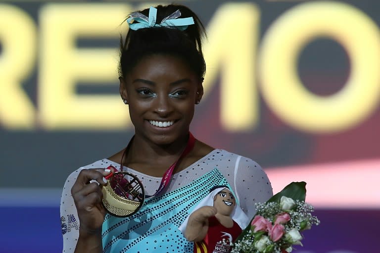 Biles wins record 13th world gold but denied clean sweep