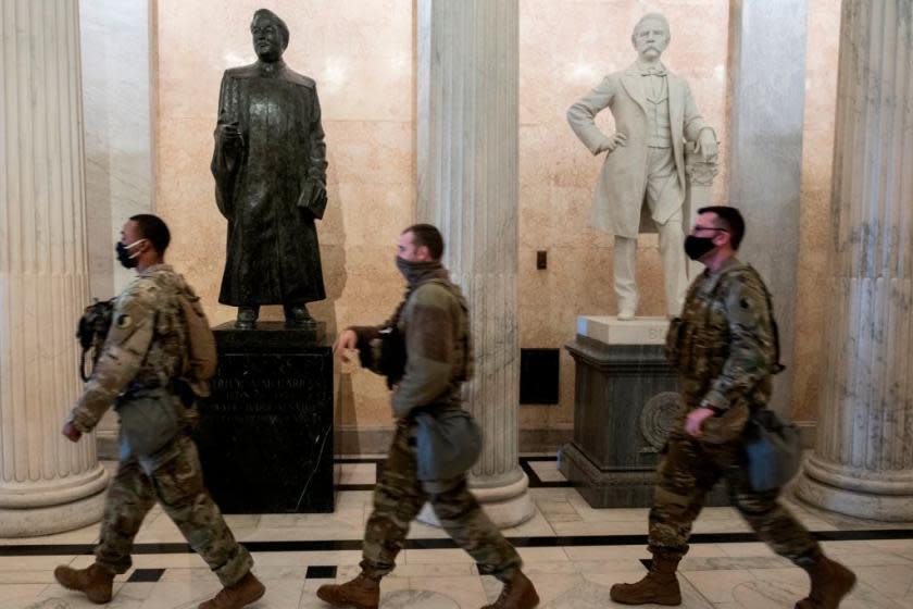 Far-right extremists allegedly discussed posing as members of the National Guard in DC