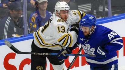 Getty Images - Toronto, ON - May 2: Boston Bruins center Charlie Coyle checks Toronto Maple Leafs defenseman Ilya Lyubushkin in the second period. (Photo by Matthew J. Lee/The Boston Globe via Getty Images)