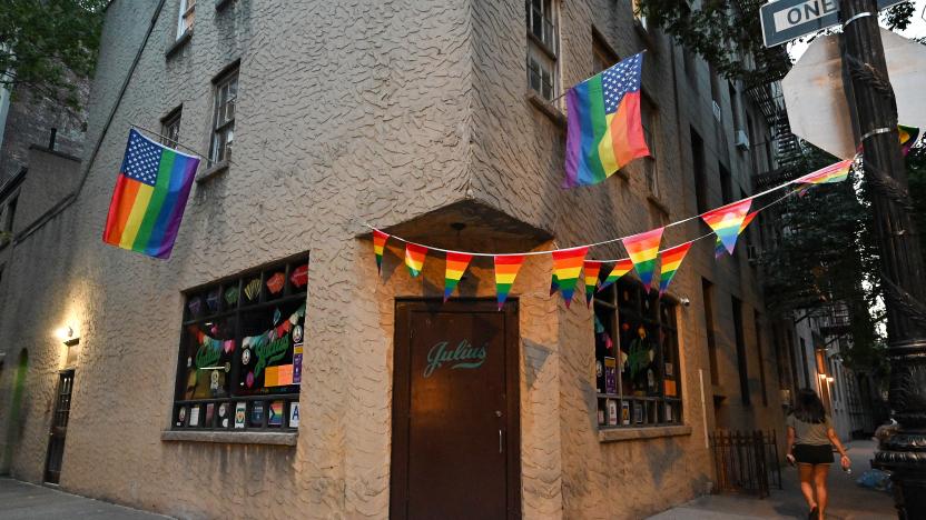 NEW YORK, NEW YORK - JUNE 22: Pride flags hang outside Julius' in the West Village on June 22, 2020 in New York City. Pride Week in New York City usually brings an influx in business to gay and lesbian bars throughout the city. This year due to the ongoing coronavirus pandemic, most Pride events have been canceled and bars remain closed in accordance with city restrictions. Last year's Pride parade drew an estimated four million people. (Photo by Dia Dipasupil/Getty Images)