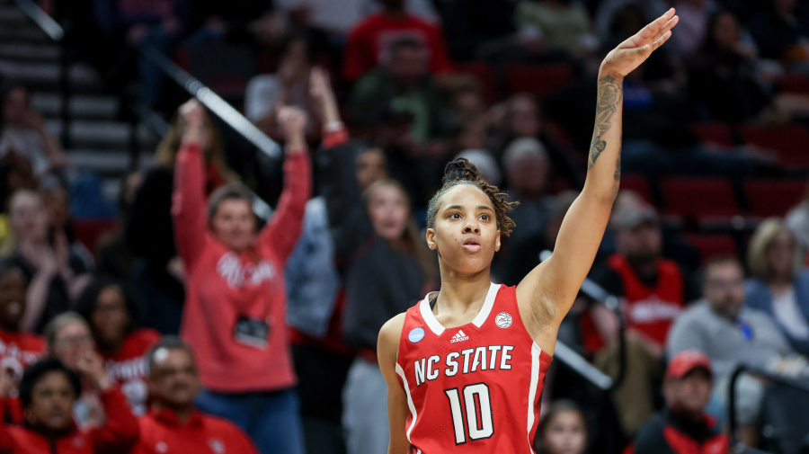 Getty Images - PORTLAND, OREGON - MARCH 29: Aziaha James #10 of the NC State Wolfpack reacts after making a three point basket during the second half against the Stanford Cardinal in the Sweet 16 round of the NCAA Women's Basketball Tournament at Moda Center on March 29, 2024 in Portland, Oregon. (Photo by Steph Chambers/Getty Images)