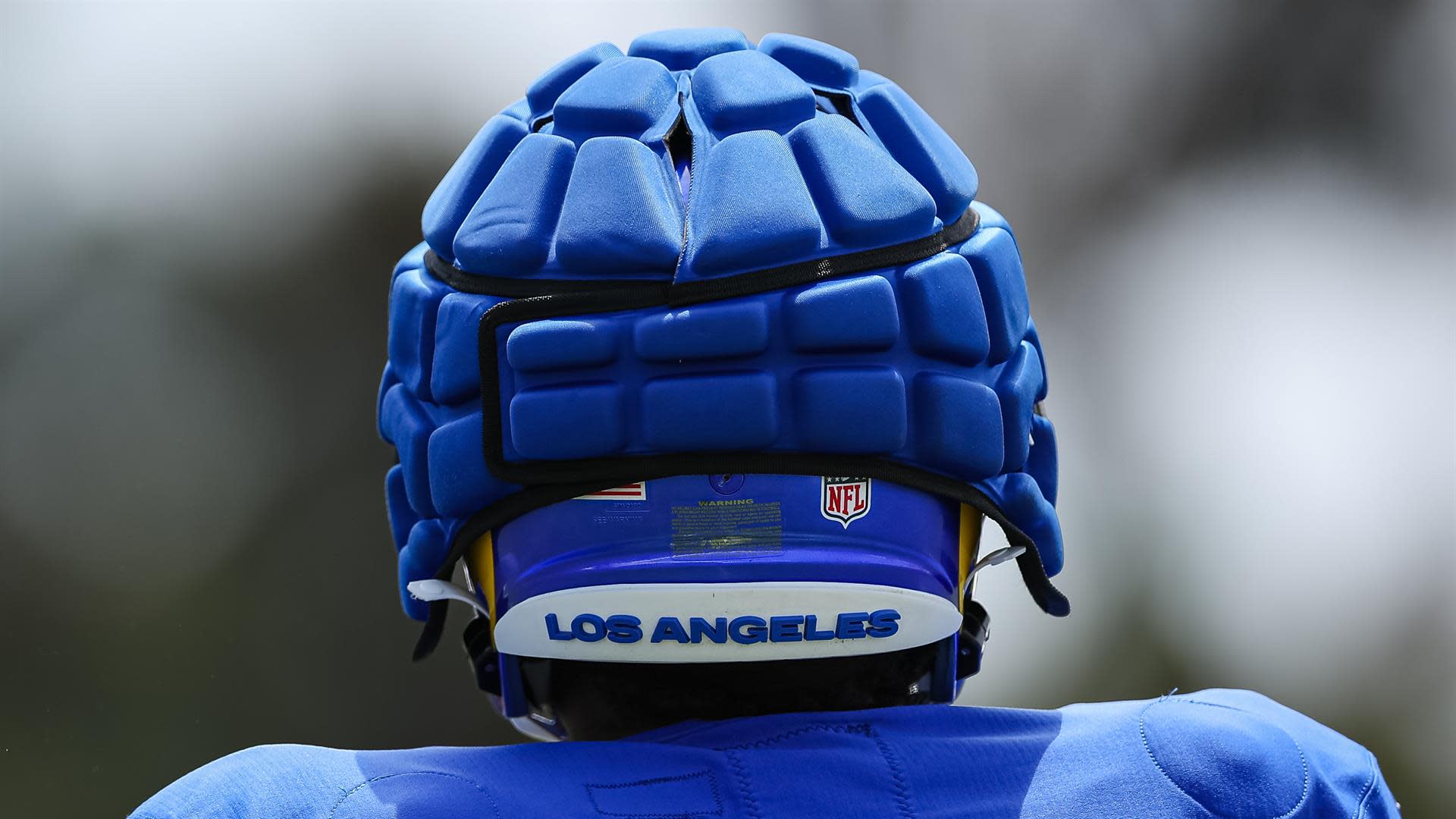 NFL players wear Guardian Caps to reduce head trauma during training camp