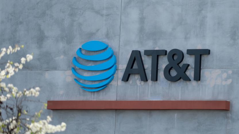 The AT&T logo sign is seen above the store in Culver City, California on January 28, 2021. - US telecommunications firm AT&T announced on May 17, 2021 a merger between its WarnerMedia unit -- which owns CNN and HBO -- and Discovery media, creating a streaming giant that could compete with Netflix and Disney+. When the deal is finalized, AT&T will receive $43 billion and AT&T's shareholders will take stock representing 71 percent of the new company, with Discovery shareholders owning 29 percent. (Photo by Chris DELMAS / AFP) (Photo by CHRIS DELMAS/AFP via Getty Images)