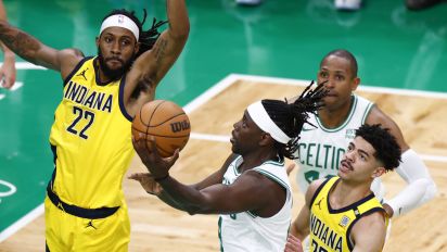 Getty Images - Boston, MA - May 21: Boston Celtics guard Jrue Holiday drives to the basket in the first quarter of Game 1 of the Eastern Conference Finals. (Photo by Danielle Parhizkaran/The Boston Globe via Getty Images)