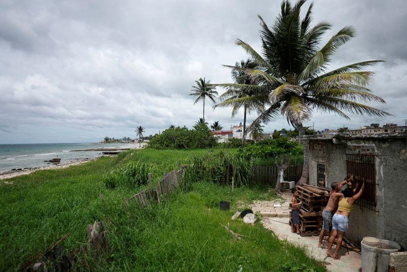Tropical storm Elsa exits Cuba trailing heavy rains, takes aim at Florida