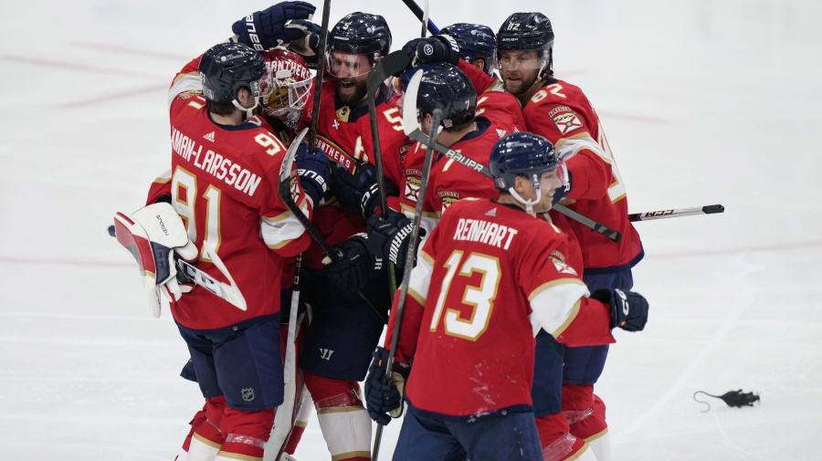 Associated Press - Florida Panthers players celebrate after beating the Tampa Bay Lightning 3-2 during an overtime period of Game 2 of the first-round of an NHL Stanley Cup Playoff series, Tuesday, April 23, 2024, in Sunrise, Fla. (AP Photo/Wilfredo Lee)