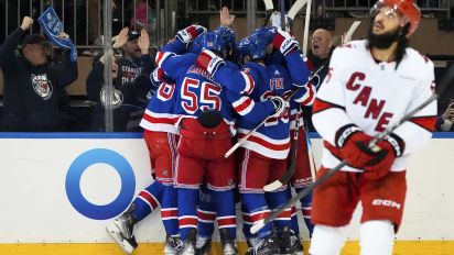 Associated Press - New York Rangers defenseman Ryan Lindgren, left wing Jimmy Vesey and others celebrate following center Mika Zibanejad's goal against the Carolina Hurricanes during the first period in Game 1 of an NHL hockey Stanley Cup second-round playoff series, Sunday, May 5, 2024, in New York. (AP Photo/Julia Nikhinson)