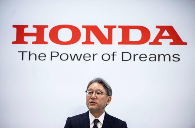 Honda president Toshihiro Mibe speaks about the automobile electrification business during a press conference at the company's headquarters in Tokyo on April 12, 2022. (Photo by Behrouz MEHRI / AFP) (Photo by BEHROUZ MEHRI/AFP via Getty Images)