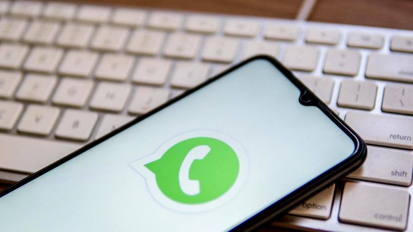 SPAIN - 2022/04/25: In this photo illustration, a WhatsApp logo seen displayed on a smartphone on top of a computer keyboard. (Photo Illustration by Thiago Prudencio/SOPA Images/LightRocket via Getty Images)