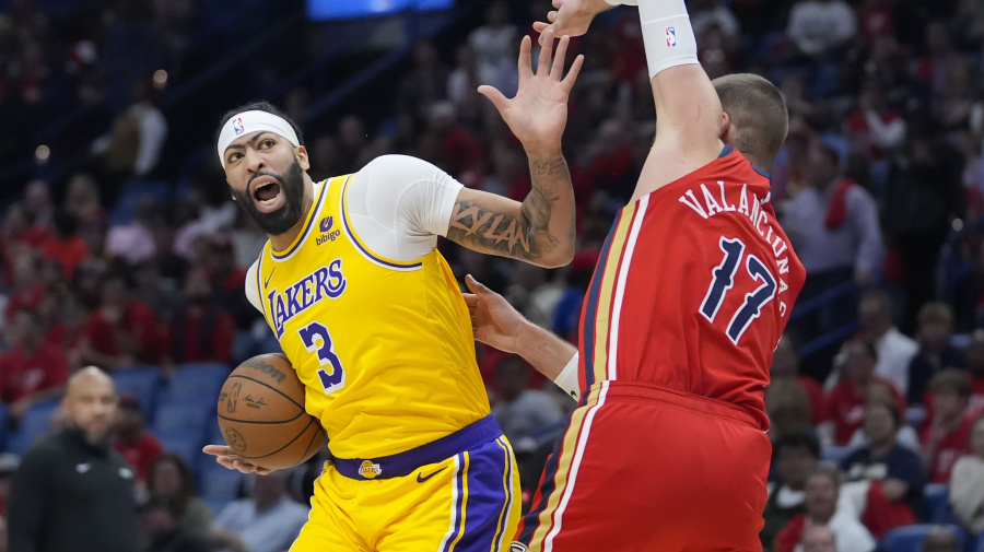 Associated Press - Los Angeles Lakers forward Anthony Davis (3) battles near the basket with New Orleans Pelicans center Jonas Valanciunas (17) in the first half of an NBA basketball play-in tournament game Tuesday, April 16, 2024, in New Orleans. (AP Photo/Gerald Herbert)