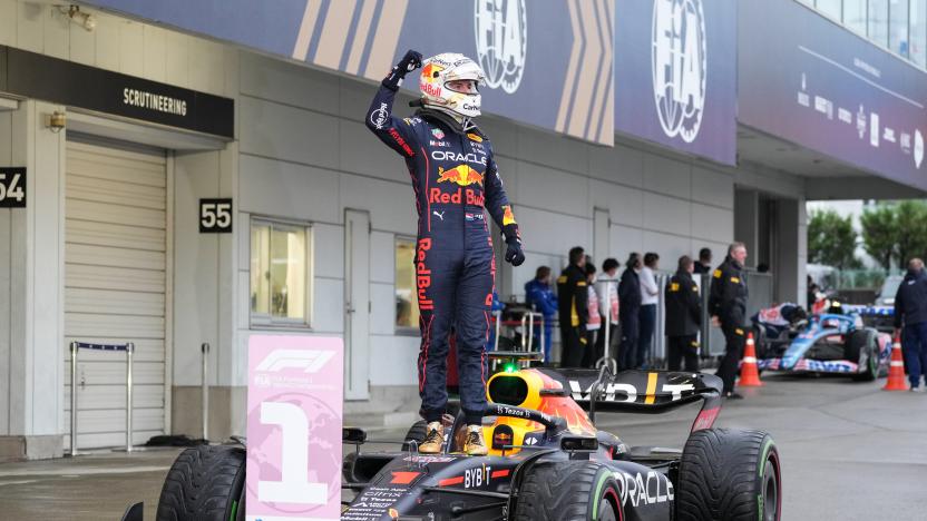 File photo taken on Oct. 9, 2022 shows Red Bull Racing's Dutch driver Max Verstappen celebrates for claiming the champion during the race of the Formula One Japan Grand Prix held at the Suzuka Circuit in Suzuka City, Japan. Red Bull's Verstappen won the F1 Japanese Grand Prix to seal the 2022 F1 Drivers' World Championship title ahead of schedule. He then took a record 14th win in a single Formula 1 season with victory in the Mexico City Grand Prix, surpassing Michael Schumacher and Sebastian Vettel's joint record of 13. With his win in the Abu Dhabi finale, Verstappen's single-season winning record was finally set at 15. (Photo by Zhang Xiaoyu/Xinhua via Getty Images)