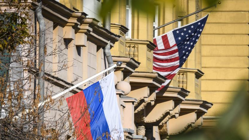 A Russian flag flies next to the US embassy building in Moscow on October 22, 2018. - US national security advisor John Bolton is in Moscow holding meetings with senior Russian officials following Washington's weekend announcement of withdrawal from the Cold War-era Intermediate-Range Nuclear Forces Treaty, known as the INF. (Photo by Mladen ANTONOV / AFP)        (Photo credit should read MLADEN ANTONOV/AFP/Getty Images)