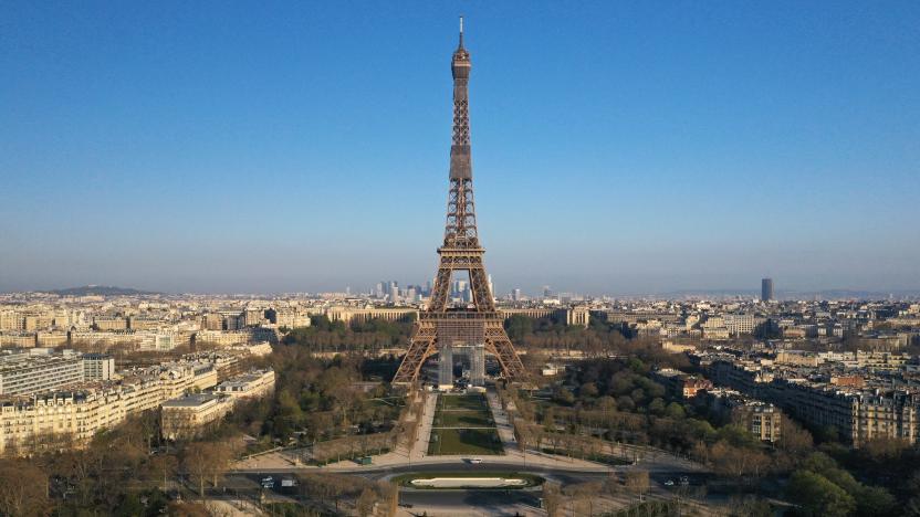 An aerial view shows the deserted Champs de Mars near the Eiffel tower in Paris during a lockdown imposed to slow the spread of the coronavirus disease (COVID-19) in France, April 2, 2020. Picture taken with a drone April 2, 2020. REUTERS/Pascal Rossignol