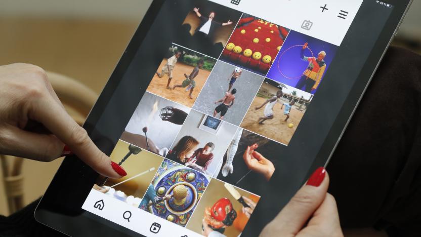 Woman reading  Instagram on an Apple iPad digital tablet.  Instagram social media app.  France. (Photo by: Philippe Lissac/Godong/Universal Images Group via Getty Images)