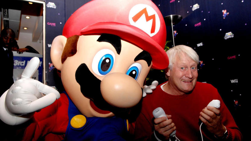 The voice of Super Mario, Charles Martinet, poses with mario at GAME Oxford Street, central London, on the evening that Super Mario Galaxy on the Nintendo Wii goes on sale in the UK.   (Photo by Stephen Kelly - PA Images/PA Images via Getty Images)