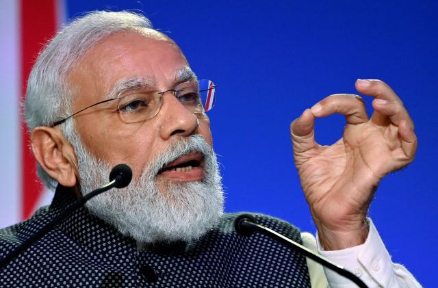 India's Prime Minister Narendra Modi speaks during the "Accelerating Clean Technology Innovation and Deployment" session at the UN Climate Change Conference (COP26) in Glasgow, Scotland, Britain November 2, 2021. Jeff J Mitchell/Pool via REUTERS