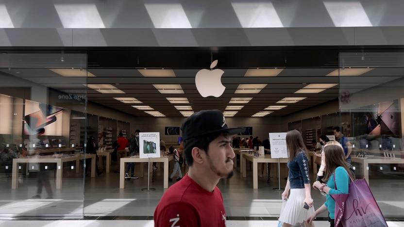 TOWSON, MARYLAND - JUNE 20: People walk past The Apple Store at the Towson Town Center mall, the first of the company's retail locations in the U.S. where workers voted over the weekend to unionize, on June 20, 2022 in Towson, Maryland. Following a late-pandemic era wave of workers demanding higher pay,  better benefits and more negotiating leverage, 65 of the 98 workers at the Towson Apple Store voted to join the International Association of Machinists and Aerospace Workers union on June 18. (Photo by Chip Somodevilla/Getty Images)