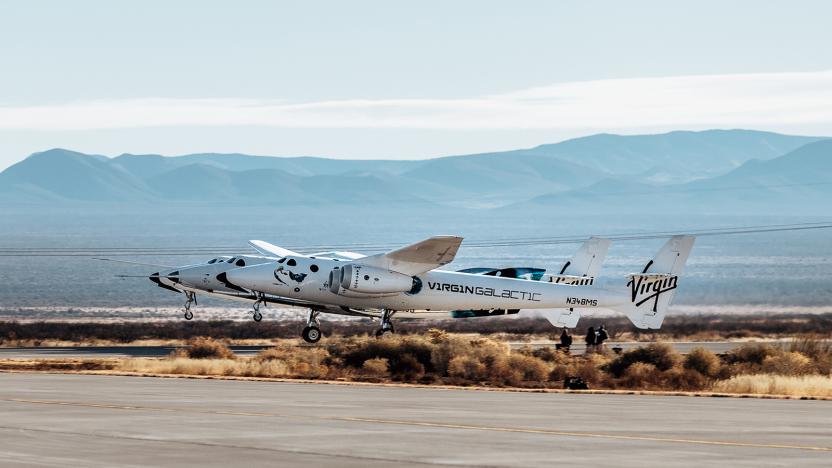 SpaceShipTwo VSS Unity aboard its host aircraft at Virgin Galactic's Spaceport America