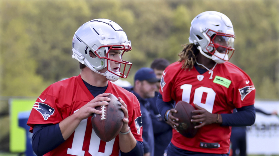 Associated Press - New England Patriots first-round draft pick quarterback Drake Maye, left, and sixth round draft pick quarterback Joe Milton, III, right, run passing drills during the NFL football team's rookie minicamp Saturday, May 11, 2024, in Foxborough, Mass. (AP Photo/Mark Stockwell)