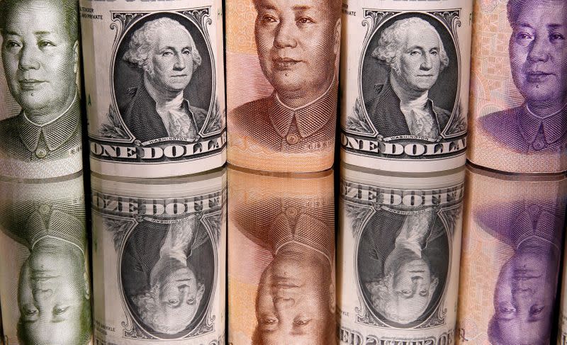 China raises foreign exchange requirements on banks to contain yuan advance