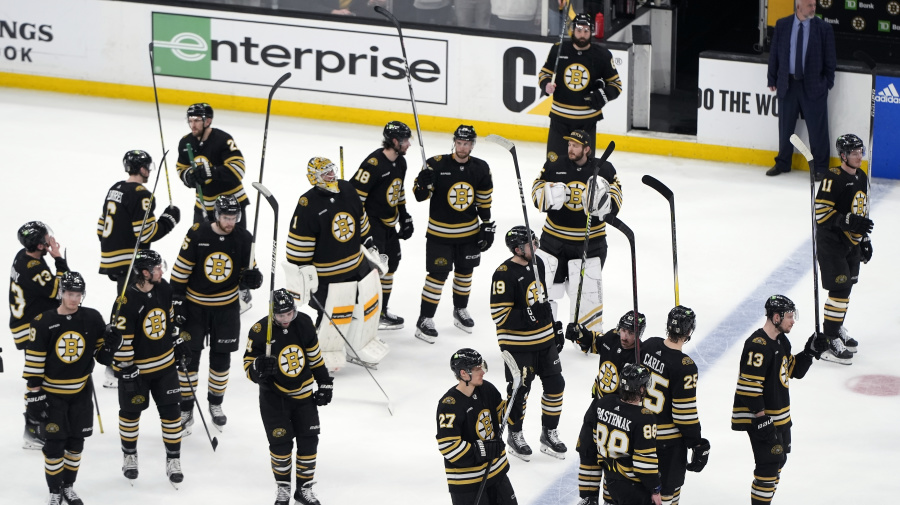 Associated Press - The Boston Bruins raise their sticks to the fans after losing to the Florida Panthers in Game 6 of an NHL hockey Stanley Cup second-round playoff series, Friday, May 17, 2024, in Boston. (AP Photo/Michael Dwyer)