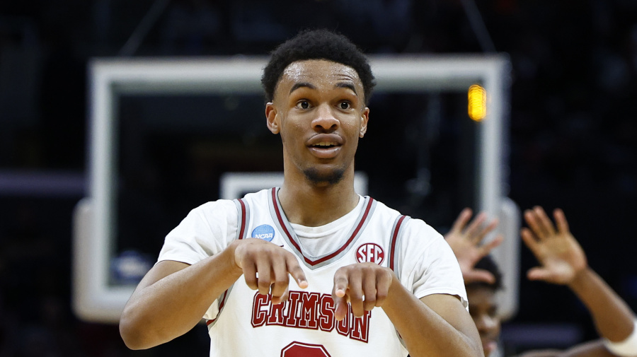 Getty Images - LOS ANGELES, CALIFORNIA - MARCH 30: Rylan Griffen #3 of the Alabama Crimson Tide reacts during the second half against the Clemson Tigers in the Elite 8 round of the NCAA Men's Basketball Tournament at Crypto.com Arena on March 30, 2024 in Los Angeles, California. (Photo by Ronald Martinez/Getty Images)