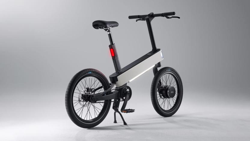 The Acer ebii e-bike is back and gray with a red light in the back. 