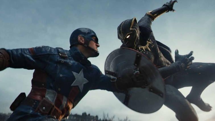 Captain America uses his shield to block an attacking Black Panther.