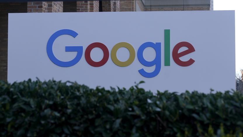 FILE - A Google sign is shown at the company's office in San Francisco, on April 12, 2023. European Union antitrust regulators on Wednesday, June 14, 2023, took aim at Google's lucrative digital advertising business, ordering the tech giant to sell off some of its ad services to address competition concerns. (AP Photo/Jeff Chiu)